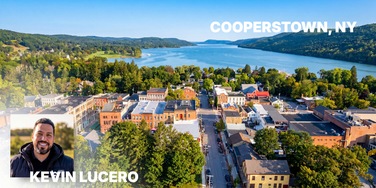 Cooperstown Village from the southern end of Otsego Lake at sunrise featuring Kevin Lucero of HomesFarmsAndLand